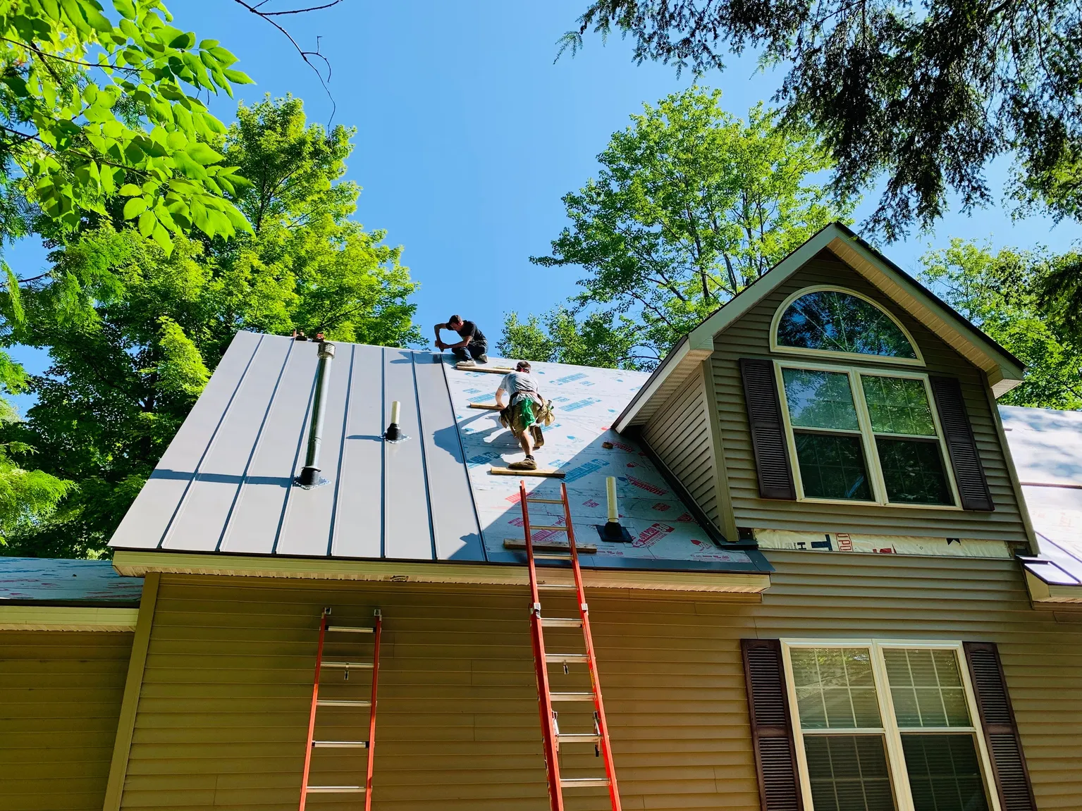 Ridge Exteriors Team hard at work on a new roofing project.